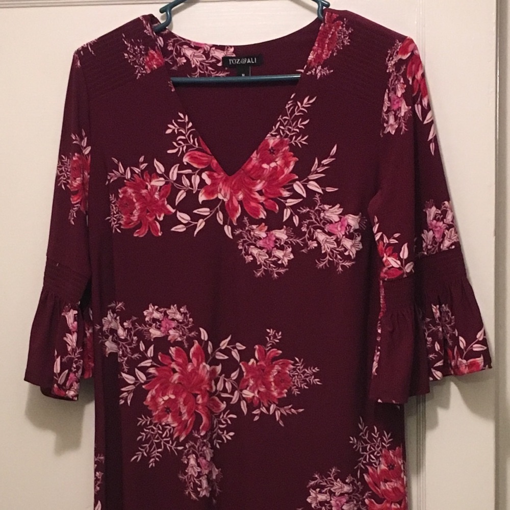 Maroon floral print dress.